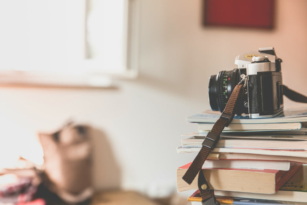 Camera on a stack of books looking out over a room. 