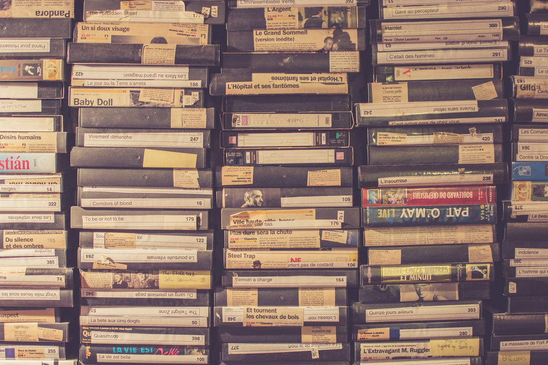 Large stack of old VHS tapes ready for recycling.