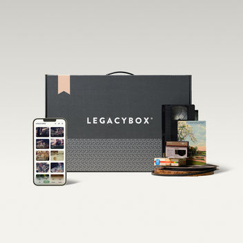 Legacybox with a phone and supported tapes, film, and photos