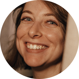 Smiling family member invited to a shared Legacybox memory